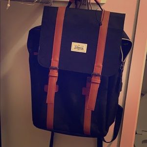 Leather laptop backpack